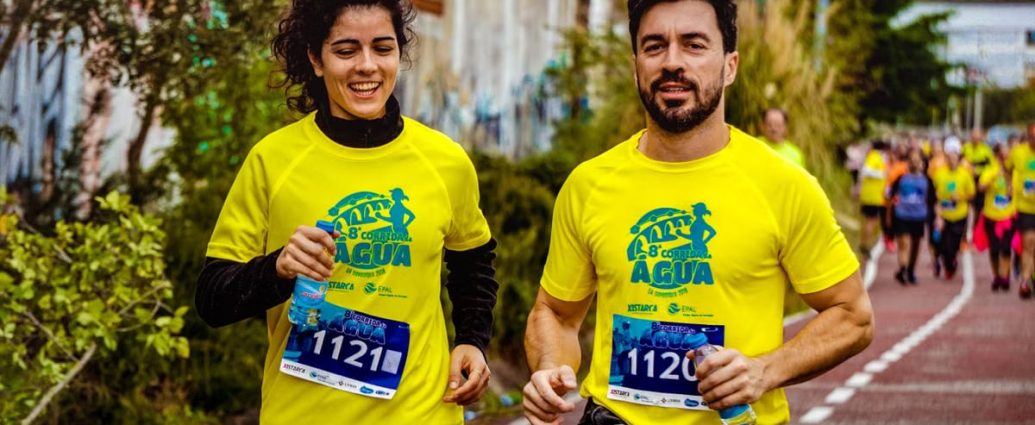Two athletes participating in a marathon, showing determination and joy.